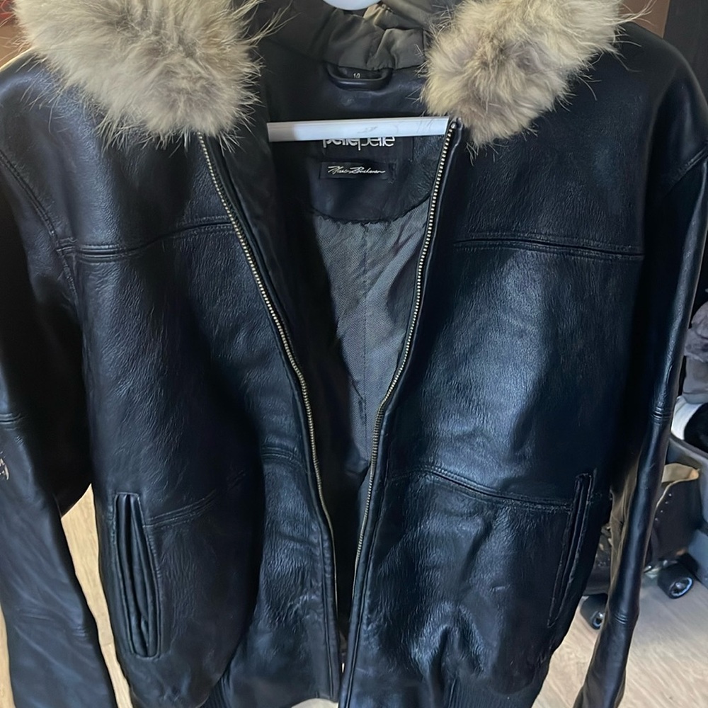 Women’s coat  pelle pelle size 14